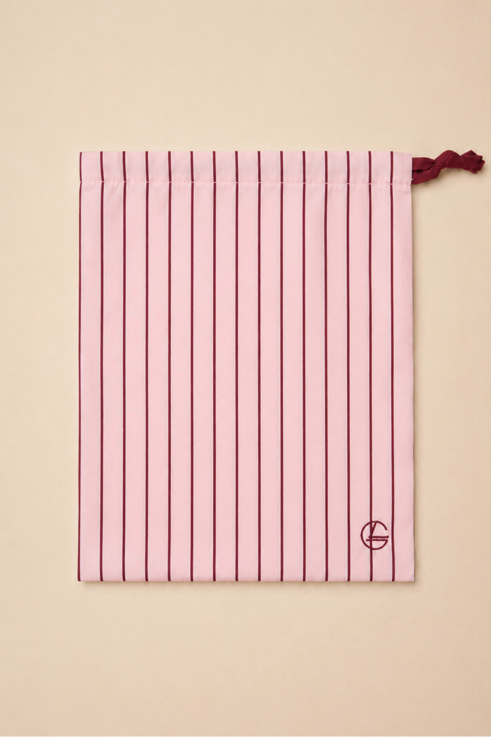 Willow Cotton Stripe PJ Set in Pink shown with its matching pink striped drawstring bag