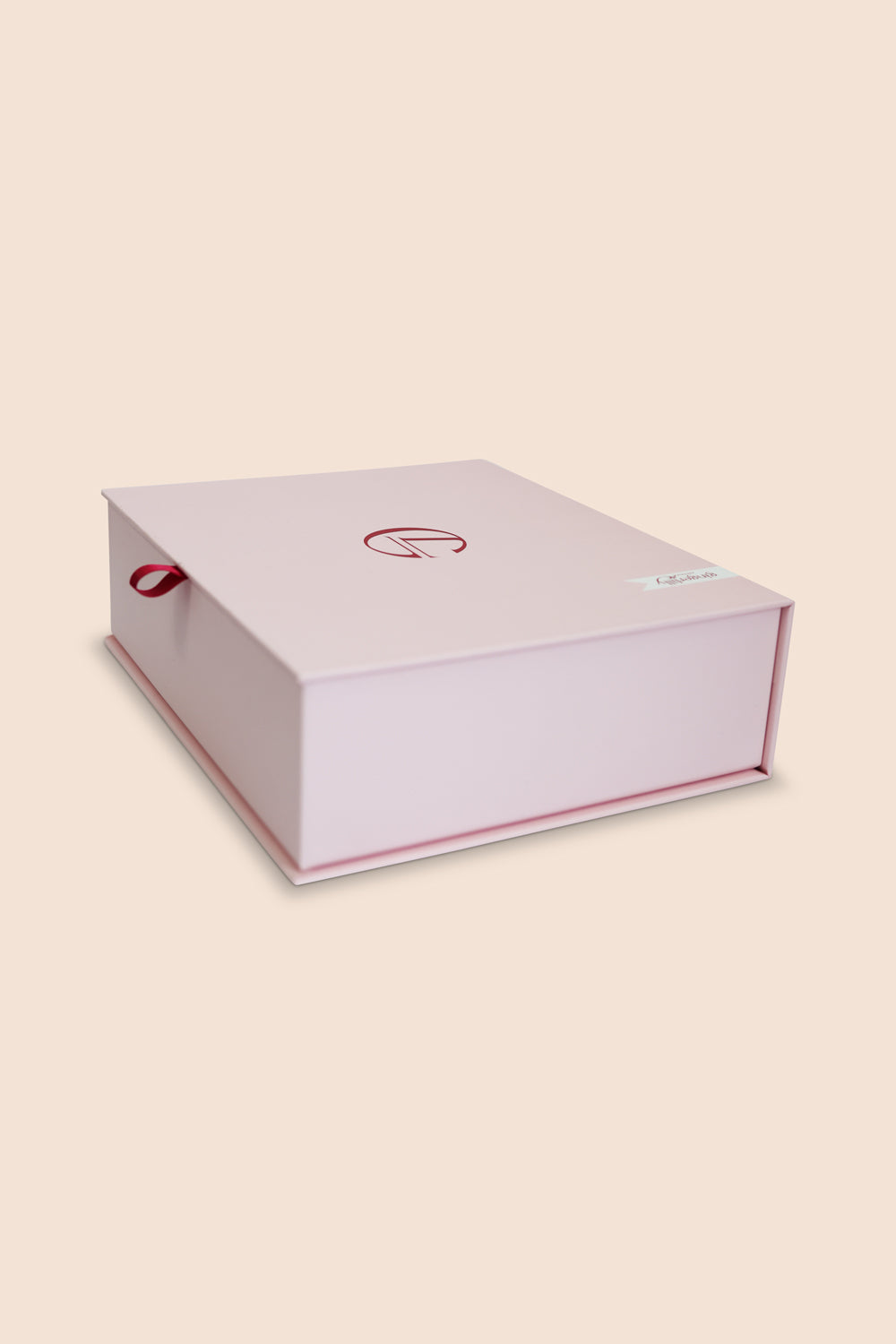 White box with red accents on a beige background