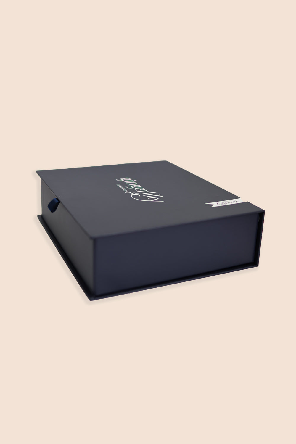 Navy Gingerlilly Sleepwear gift box with logo on lid, set against a neutral background