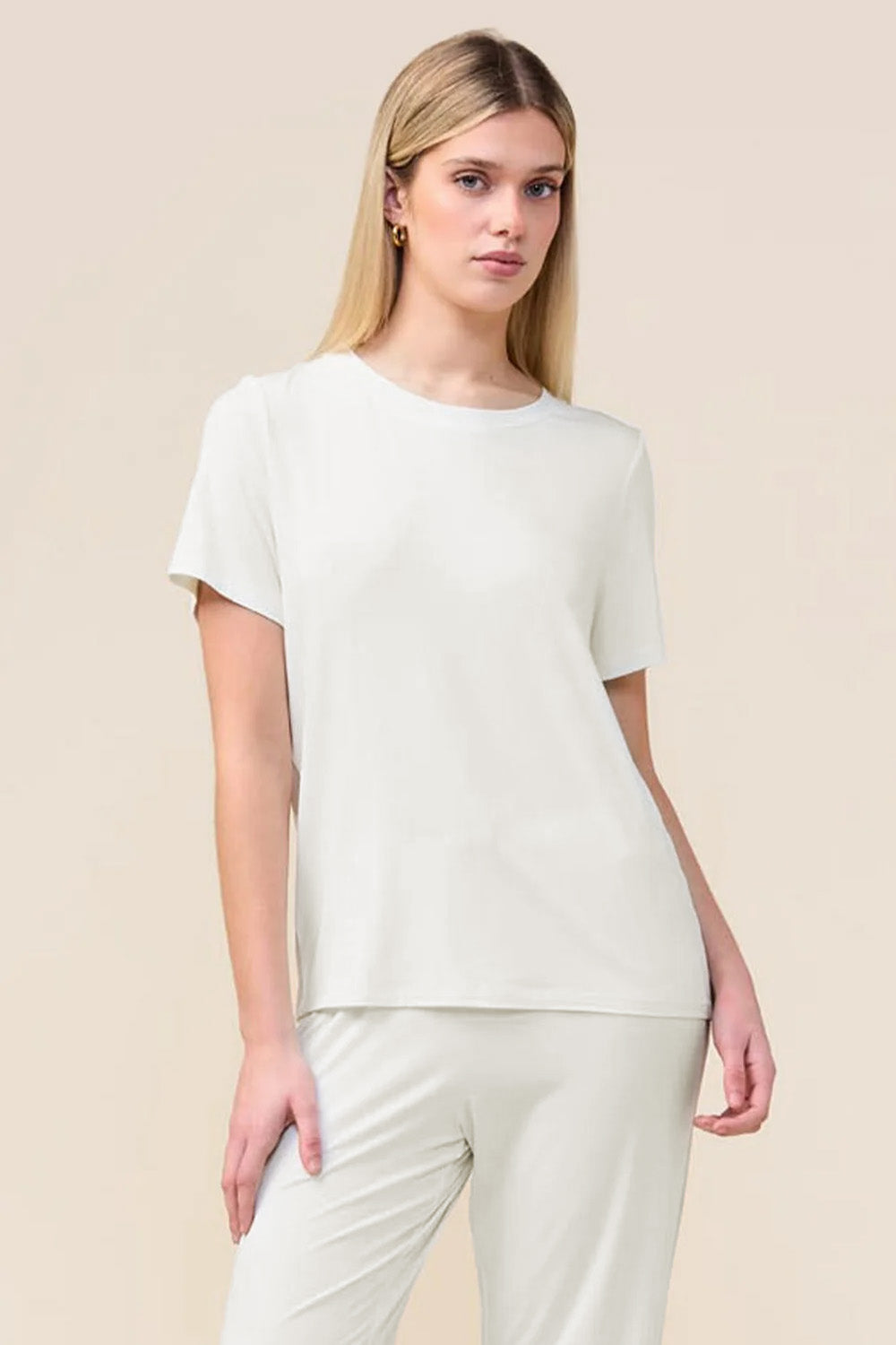 Woman wearing the Bronte Bamboo T-Shirt with Stripe in Ecru, close front view