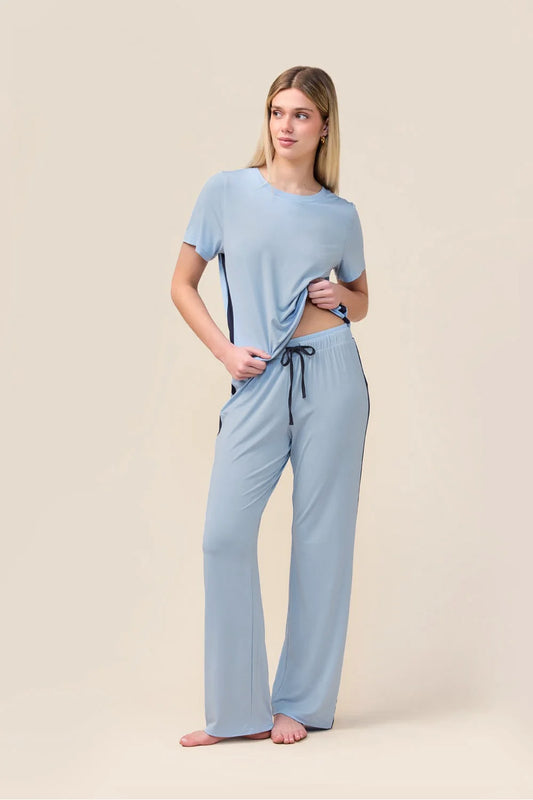 Woman wearing the Inez Bamboo Pant with Stripe in Blue, front view