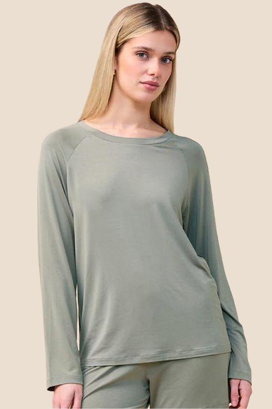 Woman wearing the Solene Long Sleeve Top with Stripe in Olive, close front view