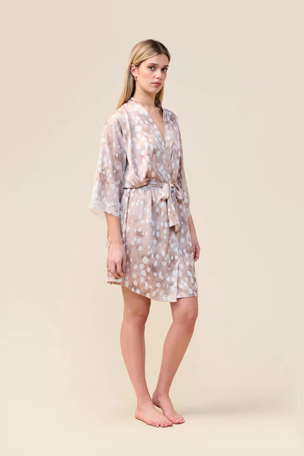 Woman wearing the Hadley Bambi Print Robe in Brown, angled front view