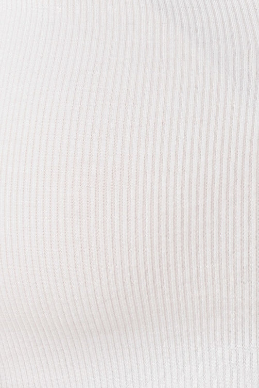 Close up of Athens Ribbed Long Pants Ivory ribbed fabric texture showing soft stretch knit