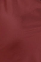 Close up of Azalia Silky Satin Short Chemise Burgundy fabric showing the smooth satin texture and rich burgundy colour with a soft sheen.