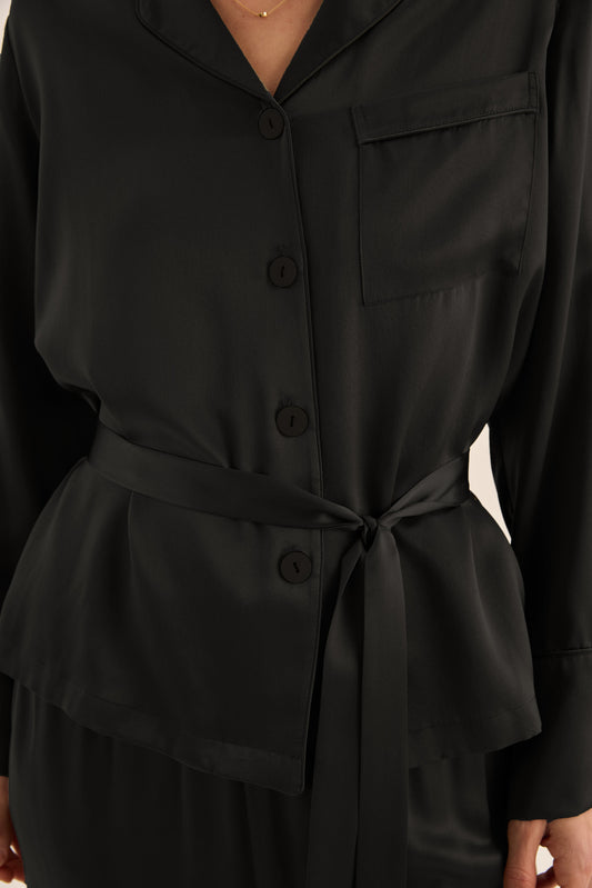 Black long-sleeve Gingerlilly Sleepwear pajama top with belt, buttons, and chest pocket