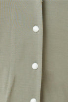 Grace Bamboo PJ Set Olive close up of covered buttons and bamboo fabric texture in soft olive tone
