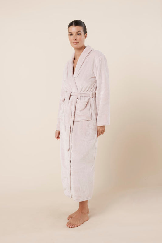 Woman wearing Imogin Pink Plush Robe side view showing relaxed maxi length silhouette