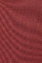 Close up of Lille Ribbed Long Sleeve Henley Top Burgundy fabric showing the vertical ribbed texture and soft stretch material.