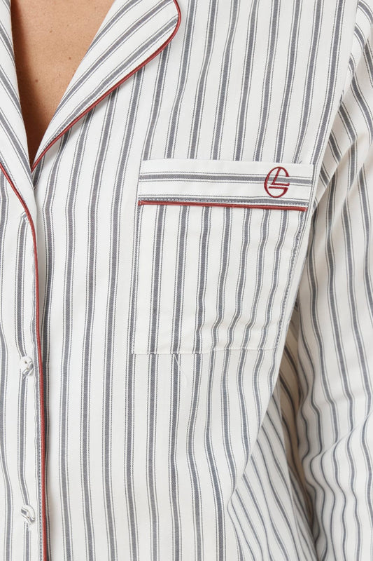 Octavia Cotton Stripe PJ Set close up of striped cotton shirt pocket with monogram embroidery and red piping