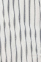 Octavia Cotton Stripe PJ Set black and white striped cotton fabric close up showing crisp lightweight weave texture
