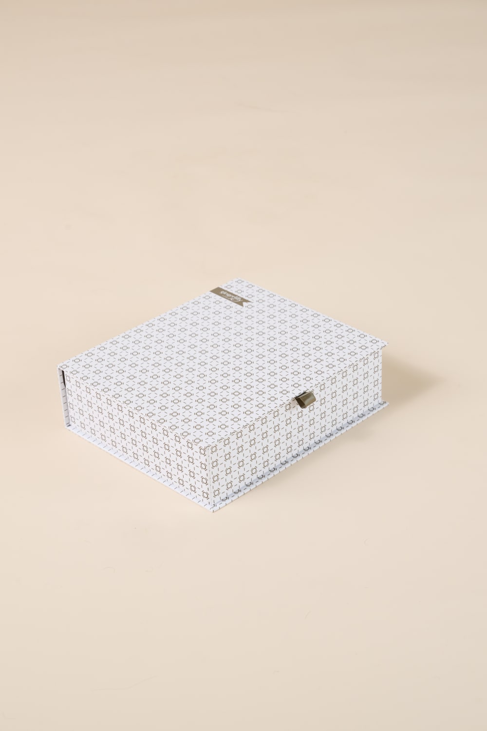 Patterned white gift box for Gingerlilly Sleepwear on beige background