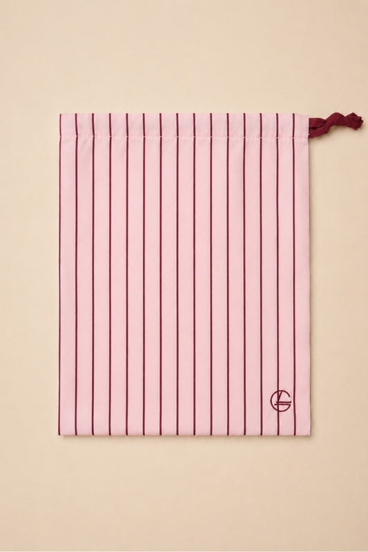 Willow Cotton Stripe PJ Set in Pink shown with its matching pink striped drawstring bag
