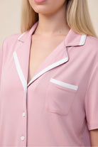 Close-up of the Allegra Short Bamboo PJ Set in Pink, showing the camp collar and pocket with white contrast trim