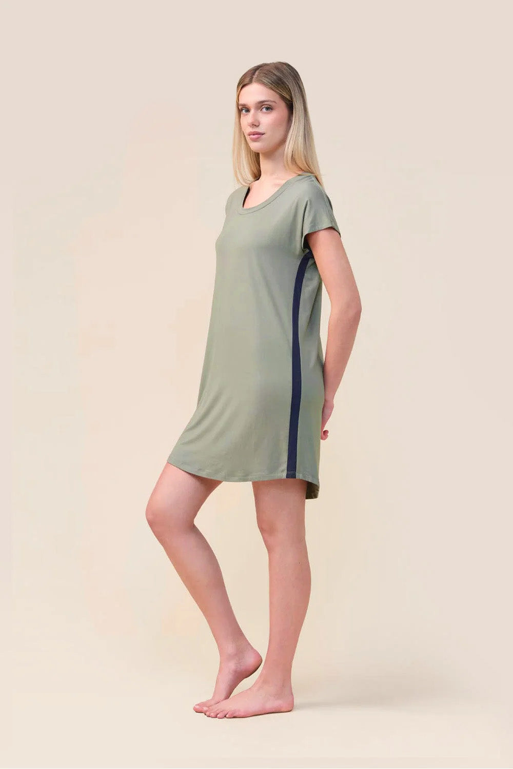 Woman wearing the Ashley Bamboo Sleep Tee in Olive, angled side view