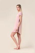 Woman wearing the Ashley Bamboo Sleep Tee in Pink, side view