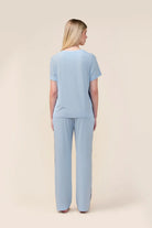 Woman wearing the Bronte Bamboo T-Shirt with Stripe in Blue, back view