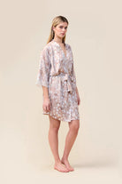 Woman wearing the Hadley Bambi Print Robe in Brown, angled front view