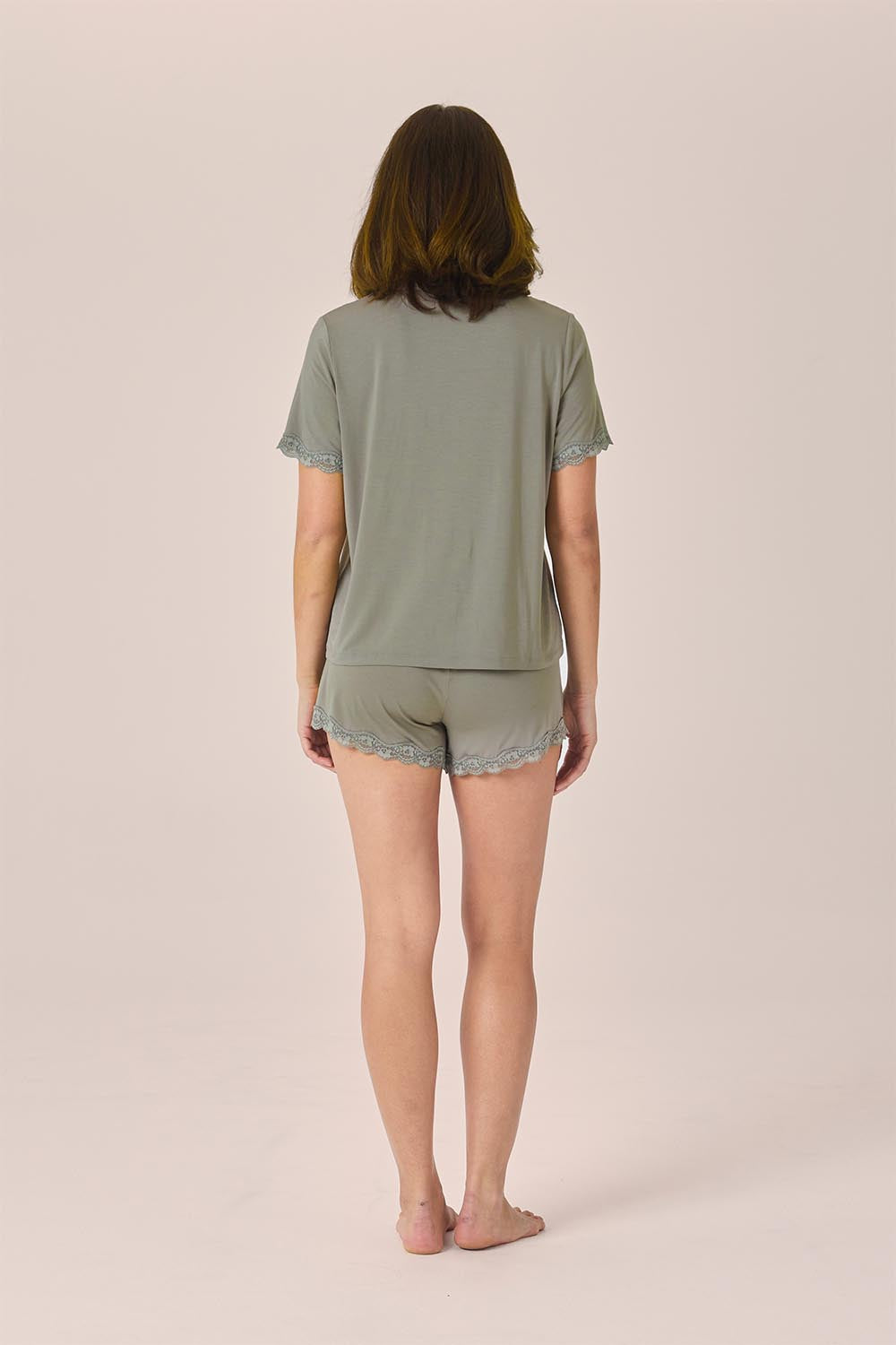 Woman wearing the Joni Bamboo Short Set with Lace in Olive, back view
