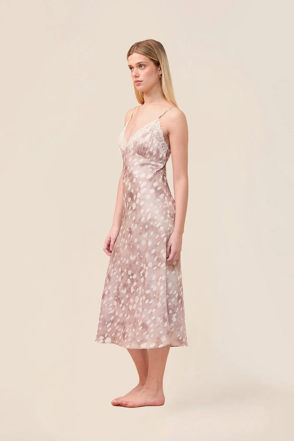 Woman wearing the Melody Bambi Print Spot Nightie in Brown, angled side view
