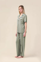 Woman wearing the Vanessa Bamboo Long Pant PJ Set in Olive, side view