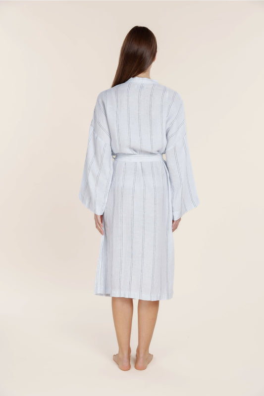 Woman in Gingerlilly Sleepwear blue striped robe, natural fabric, back view
