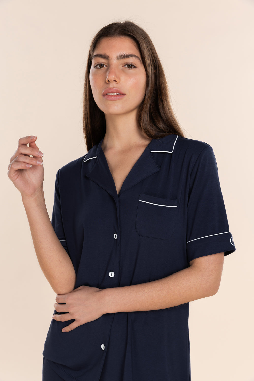 Woman wearing the Sadie Bamboo Short PJ Set in Navy, close front view