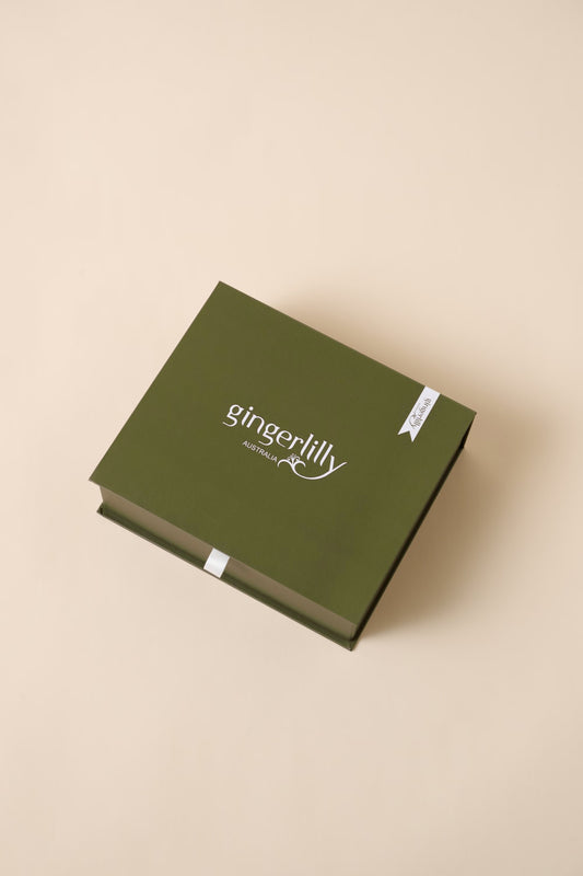 Gingerlilly Sleepwear green gift box on beige background, Australia, premium packaging